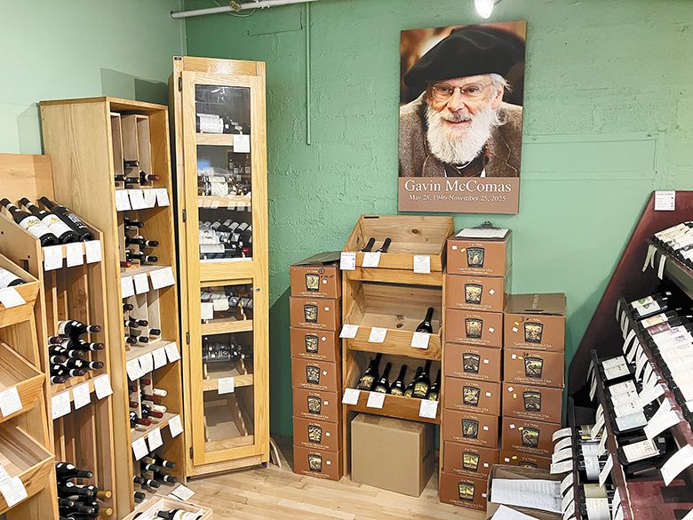 Wines on display beneath a photo of the previous owner Gavin McComas of Sundance Wine Cellars. ## Photo by Pete Holland