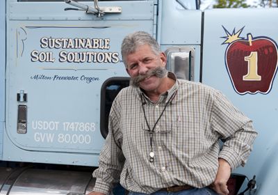 Rick Trumbull and his son, Travis, work with clients to
improve soil quality and encourage them to become stewards of the land. Rick Trumbull and his son, Travis, work with clients to
improve soil quality and encourage them to become stewards of the land.