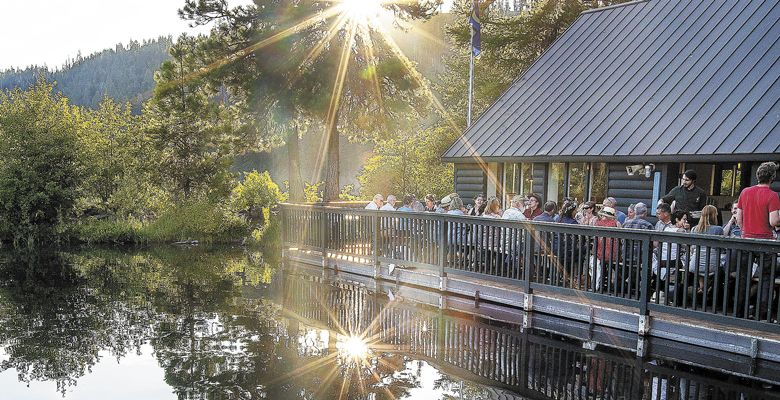 : The sun slips behind the Boathouse Restaurant at The Suttle Lodge.  ##Photo by Barbara Gonzalez