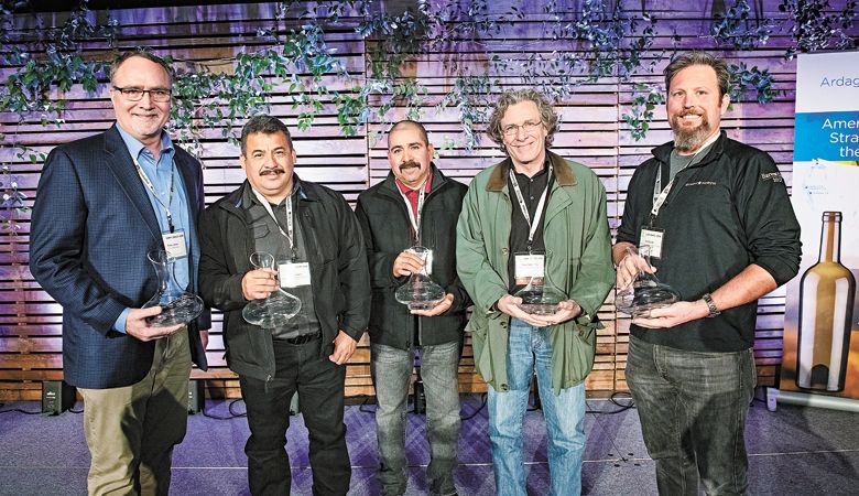 Awards were
given to Greg
Jones (from left),
Moises Sotelo, Nahum
Bahena, Steve
Robertson and
Herb Quady, as
well as John Pratt
(not pictured). ##Photo by Carolyn Wells-Kramer
