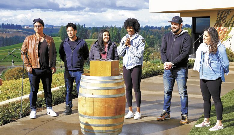 Chefs Byron Gomez (from left), Shota Nakajima, Jamie Tran, Dawn Burrell, Gabe Erales and Maria Mazon at Willamette Valley Vineyards’ Salem Hills estate after the finalists (Nakajima, Burrell, Erales) drew knives to see who would choose their sous chef first to aid in the final elimination challenge of “Top Chef: Portland.” ##Photo by David Moir/Bravo