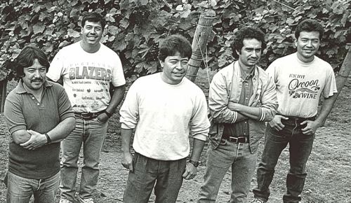 The original Tualatin Estate Vineyard and Winery crew, taken in 1980. Miguel Loeza, Willamette Valley Vineyards  current vineyard foreman, is standing in the center. Efren Loeza, Willamette Valley Vineyards  current vineyard manager, is on the far right. ## Photo provided by Willamette Valley Vineyards