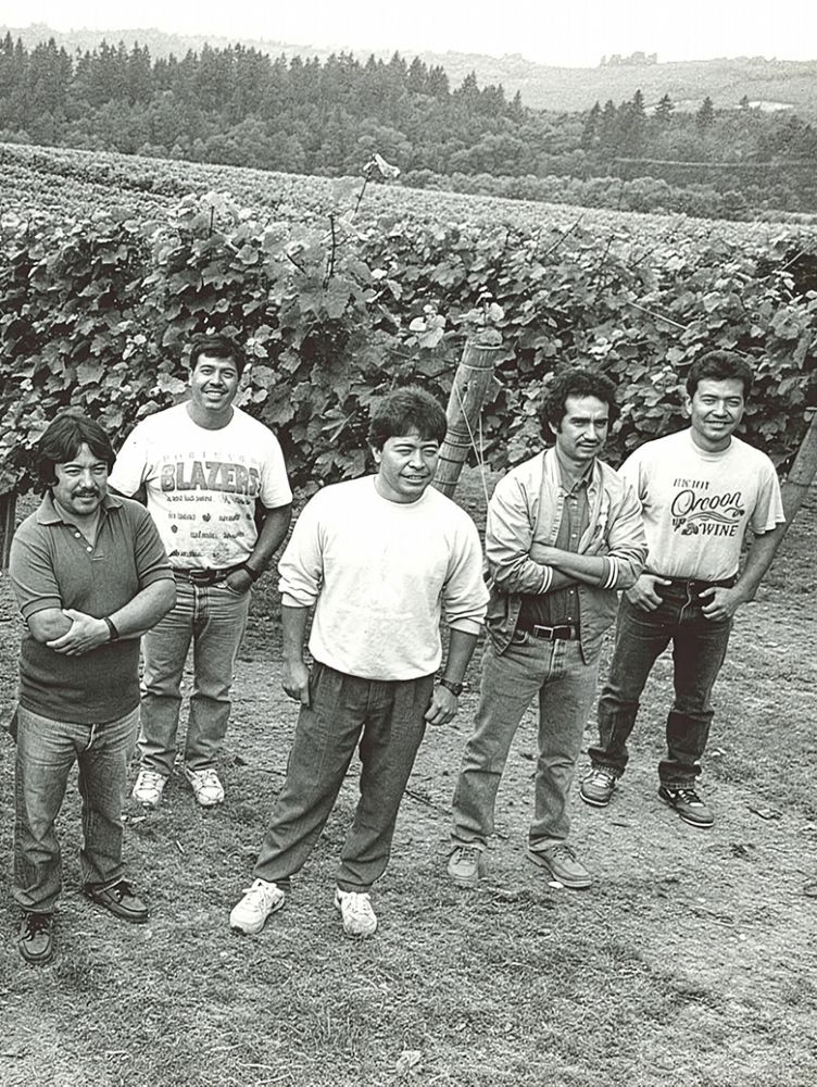 The original Tualatin Estate Vineyard and Winery crew, taken in 1980. Miguel Loeza, Willamette Valley Vineyards  current vineyard foreman, is standing in the center. Efren Loeza, Willamette Valley Vineyards  current vineyard manager, is on the far right. ## Photo provided by Willamette Valley Vineyards
