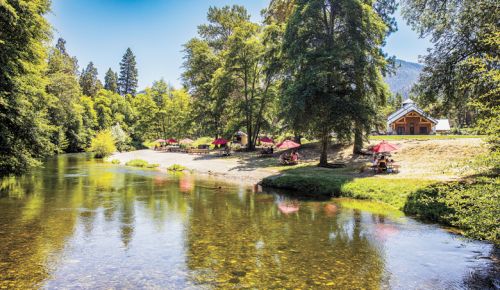 Visitors at Red Lily Vineyards can enjoy wine along the banks of the Applegate River.