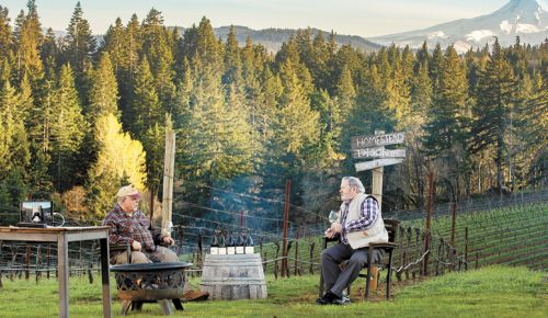 Phelps Creek Vineyard owner Bob Morus (left) and enologist Bill Swain discuss a selection of wines during a virtual tasting at the Columbia Gorge estate. ##Photo by  Kathryn Elsesser