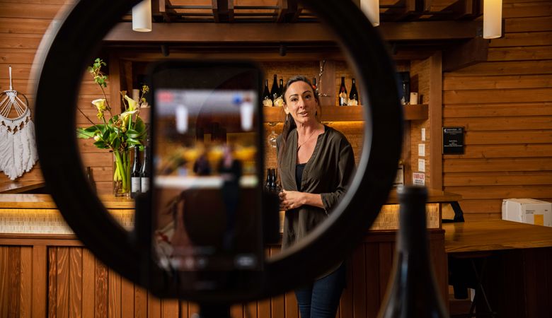 Seufert Winery team members Michelle Wasner and Sara Weikert record a virtual tasting in the Dayton tasting room.  ##Photo by  Kathryn Elsesser