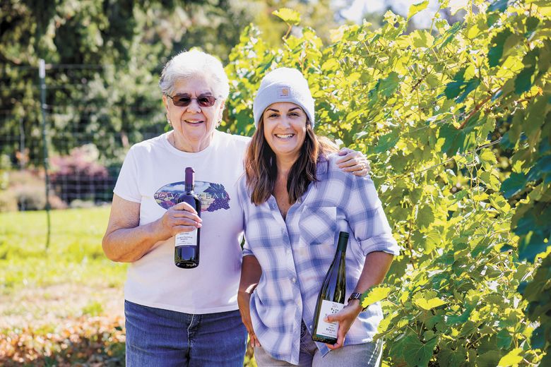 Pavo Real Vineyard owner and viticulturist Virginia Oaxaca (left) with fellow viticulturist and niece Elisa Anthony. ##Photo by Molly Bermea