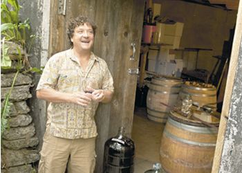 Francois Serrou makes homemade wine
at his North Portland home in an underground
room behind his house. Photo by Andrea Johnson.