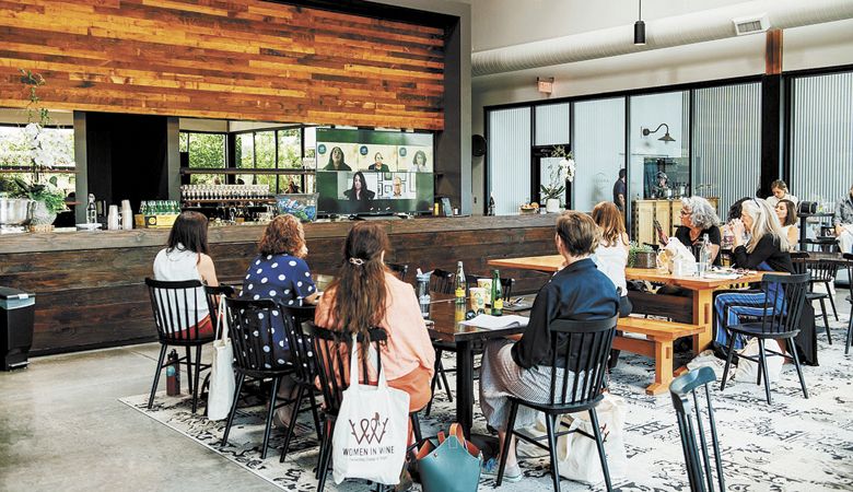 Participants at the 2021 Women in Wine conference listen to speakers via Zoom at Argyle.##Photo by Kathryn Elsesser