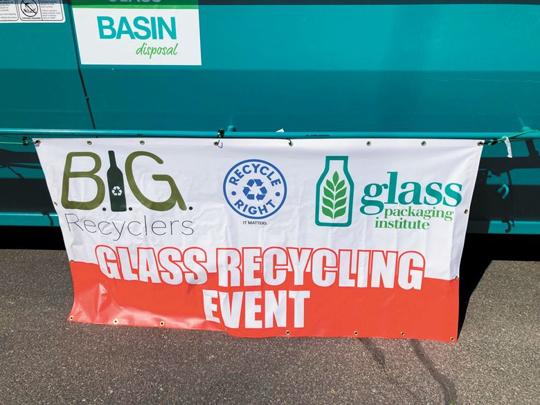 Banner announcing a BIG Recyclers glass collection event.##Photo by Chris Lueck