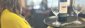 A student serving a bottle of College Cellars wine. ## Photo provided by Walla Walla Community College