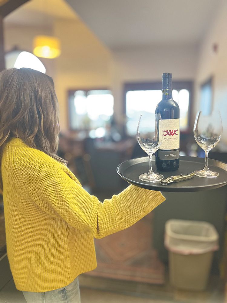 A student serving a bottle of College Cellars wine. ## Photo provided by Walla Walla Community College