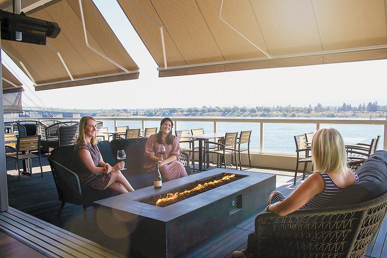Guests of Willamette Valley Vineyards can relax on their spacious patio overlooking the Columbia River.##Photo by Will Hawkins for Willamette Valley Vineyards