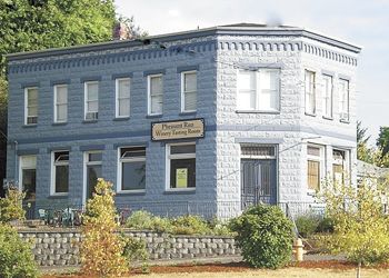 The 1902 Aurora State Bank Building was home to many businesses before becoming Pheasant Run’s tasting room this year.