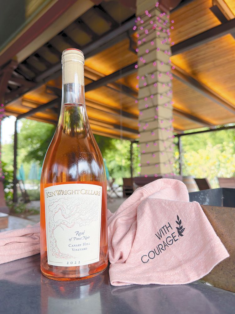 A bottle of Ken Wright Cellars ros&eacute; and a pink With Courage shirt. ## Photo provided by With Courage