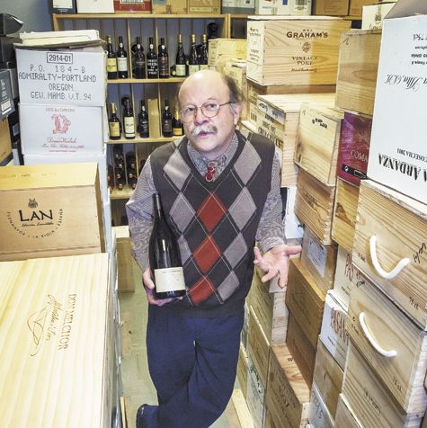 Tom Reider, longtime wine manager at Wizer’s in downtown Lake Oswego, stands among the market’s international cellar located in the basement. Tom Reider, longtime wine manager at Wizer’s in downtown Lake Oswego, stands among the market’s international cellar located in the basement.