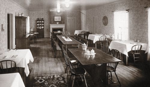 Old photo of the empty dining room at Wolf Creek Inn & Tavern in the Applegate Valley.
