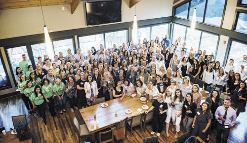 Women in Wine: Fermenting Change seminar. Guests, workers and speakers pause for a group shot inside Willamette Valley Vineyards’ tasting room. ##Photo by Kathryn Elsesser