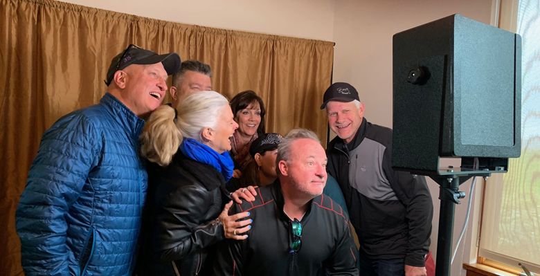 Friends pose in the photo booth at this year’s Yamhill-Carlton AVA Spring Tasting at WillaKenzie Estate. ##Photo by Kerry McDaniel Boenisch