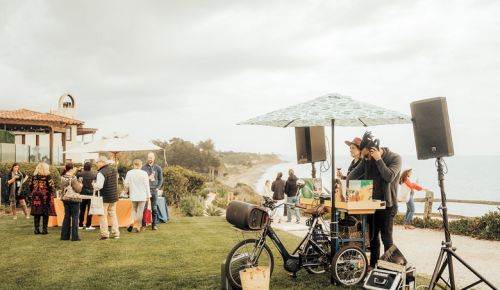A bicycling DJ spins tunes for wine tasters on the Bacara lawn overlooking the beach and Pacific Ocean.##Photo provided by World of Pinot Noir