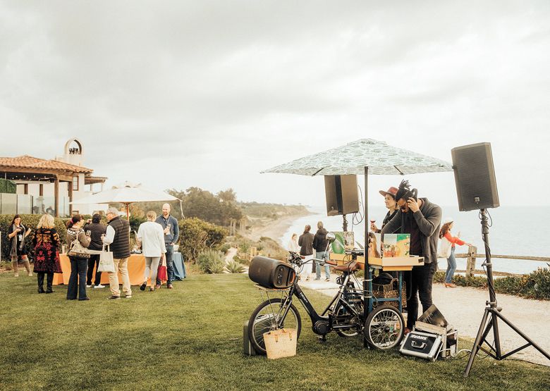 A bicycling DJ spins tunes for wine tasters on the Bacara lawn overlooking the beach and Pacific Ocean.##Photo provided by World of Pinot Noir