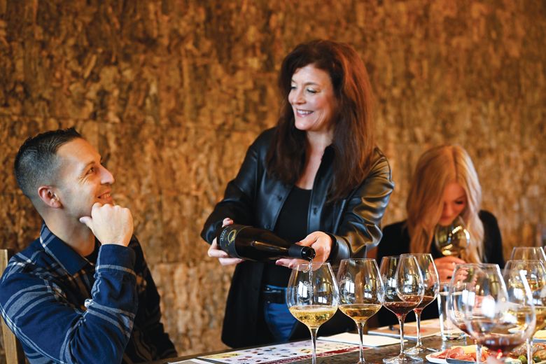 Winery guests enjoying an elevated tasting experience.