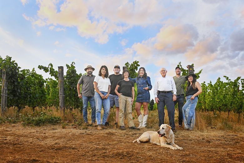 From left; Miguel Lopez, Elena Rodriguez, Sam Parra, Cristina Gonzales, DeAnna Ornelas, Neal D. Hulkower, Bryan Berenguer, Sofia Torres McKay and dog Lava girl.