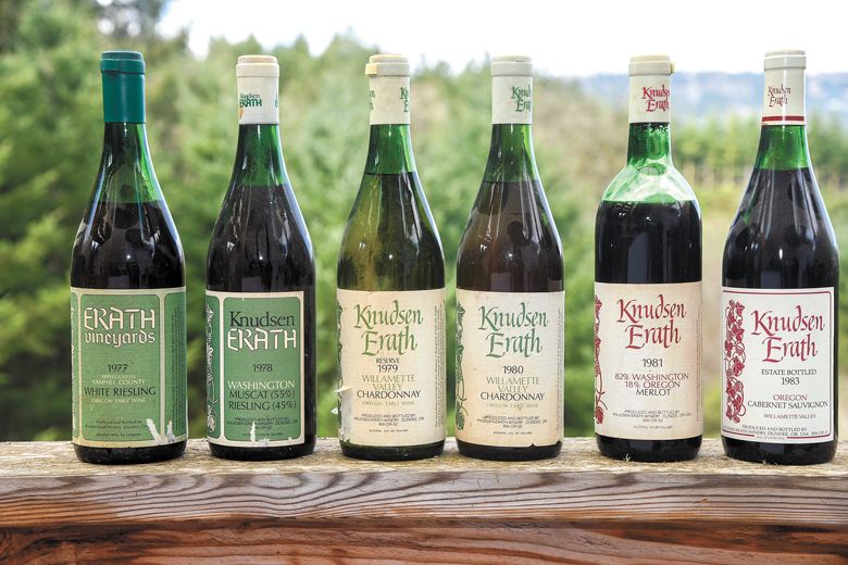 Bottles of Knudsen Erath wines from 1977 to 1983, from Kerry McDaniel Boenisch’s collection. ##Photo courtesy of the News-Register