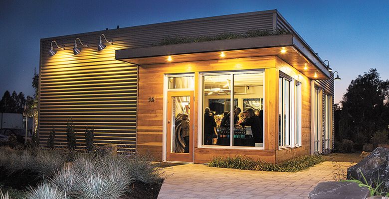 Architect Woodson Rainey Jr. and Cellar Ridge Construction transformed a dilapidated gas station into the sleek Chapter 24 tasting room.##Photo Provided