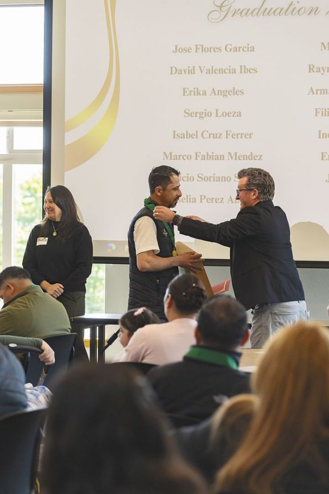 AHIVOY graduate Armando Hernandez receiving his medallion and diploma. 
## Photo by Sydney Jones