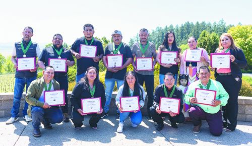 AHIVOY’s 2025 cohort graduates; back row, from left: Armando Hernandez, Marco Fabian Mendez, David Valencia Ibes, Sergio Loeza, Jorge Loeza, Roselia Perez Ambriz, Inocencia Bravo, Erika Angeles; front row, from left: Mario Ramirez, Filiberta Andrade, Isabel Cruz Ferrer, Mauricio Soriano Sanchez, and Raymundo Madrigal. ## Photo by Sydney Jones