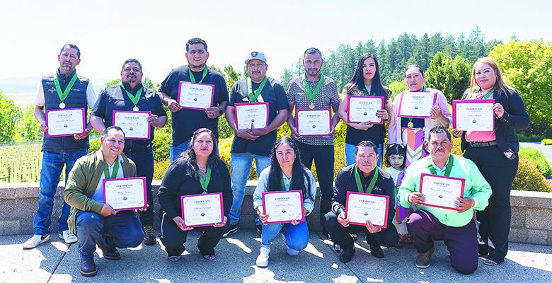 AHIVOY’s 2025 cohort graduates; back row, from left: Armando Hernandez, Marco Fabian Mendez, David Valencia Ibes, Sergio Loeza, Jorge Loeza, Roselia Perez Ambriz, Inocencia Bravo, Erika Angeles; front row, from left: Mario Ramirez, Filiberta Andrade, Isabel Cruz Ferrer, Mauricio Soriano Sanchez, and Raymundo Madrigal. ## Photo by Sydney Jones