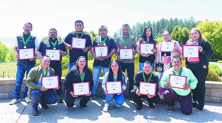 AHIVOY’s 2025 cohort graduates; back row, from left: Armando Hernandez, Marco Fabian Mendez, David Valencia Ibes, Sergio Loeza, Jorge Loeza, Roselia Perez Ambriz, Inocencia Bravo, Erika Angeles; front row, from left: Mario Ramirez, Filiberta Andrade, Isabel Cruz Ferrer, Mauricio Soriano Sanchez, and Raymundo Madrigal. ## Photo by Sydney Jones