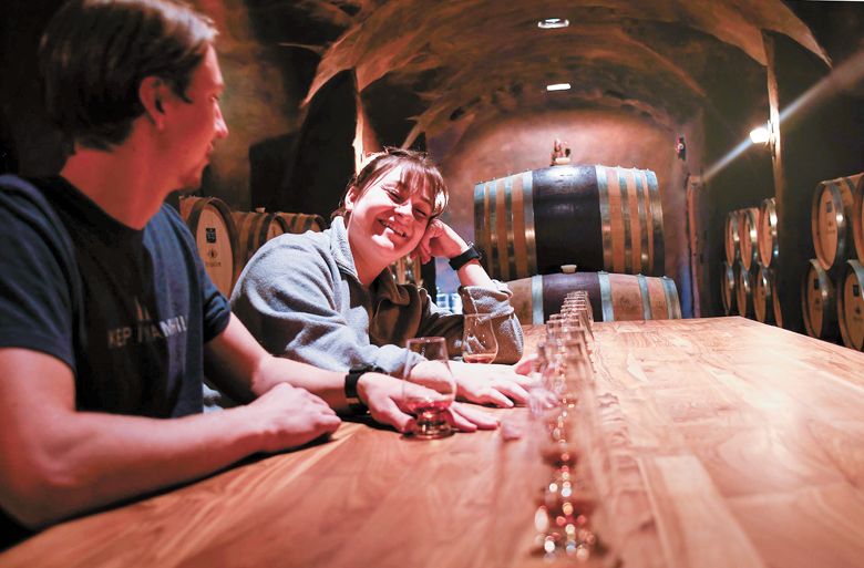 Co-lead distillers Jackson Harloff and Tatum Frey blending spirits in the barrel cave.##Photo provided Co-lead distillers Jackson Harloff and Tatum Frey blending spirits in the barrel cave.##Photo provided