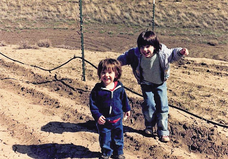 Sager Small, Woodward Canyon s co-owner and current vineyard manager (left) with Jordan Small, co-owner and general manager, taken in the late ‘80s or early ‘90s. ##Photo provided by Woodward Canyon Sager Small, Woodward Canyon s co-owner and current vineyard manager (left) with Jordan Small, co-owner and general manager, taken in the late ‘80s or early ‘90s. ##Photo provided by Woodward Canyon
