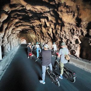 MountNbarrelL leads bicycle tours through the scenic Mosier Twin Tunnels. ##Photo provided by MountNbarrelL