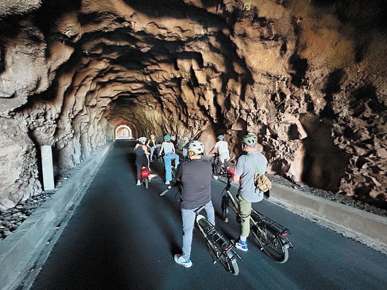 MountNbarrelL leads bicycle tours through the scenic Mosier Twin Tunnels. ##Photo provided by MountNbarrelL