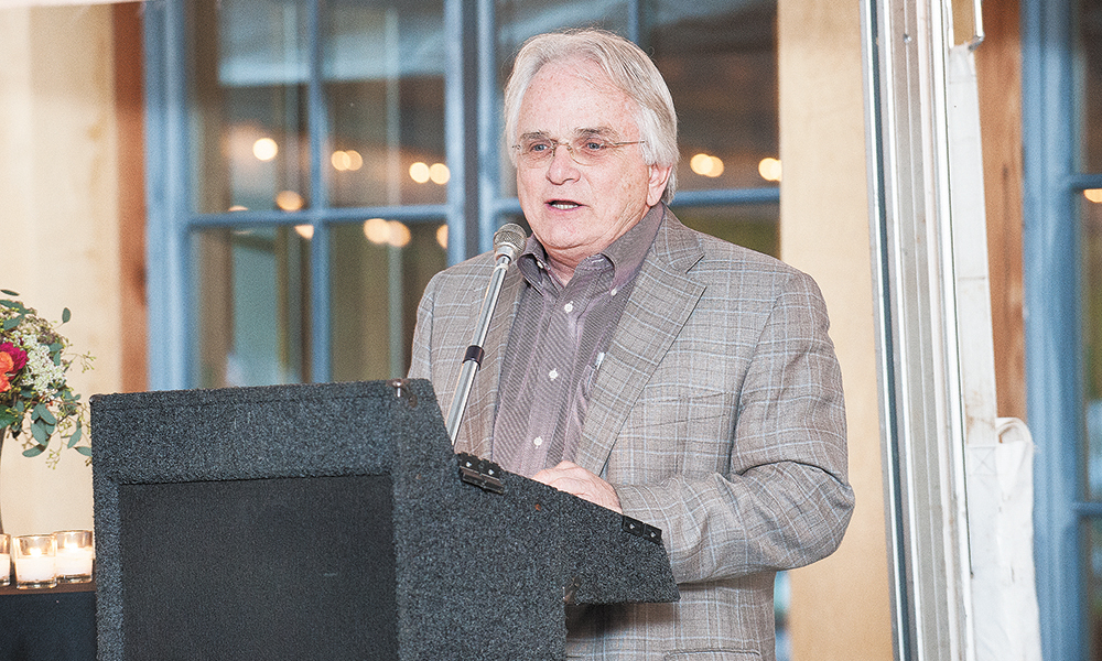 Chehalem Wines founder Harry Peterson-Nedry, a 2009 inductee, introduces honorees Pat and Joe Campbell. ##Photo by Marcus Larson