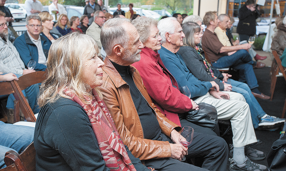 Oregon Wine Walk of Fame 2014 honorees Pat and Joe Campbell listen to comments during the induction ceremonies at Dundee Bistro. The Campbells founded Elk Cove Vineyards in 1974. ##Photo by Marcus Larson