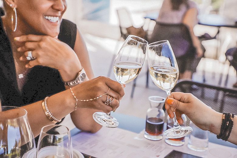 Two wine lovers click glasses filled with Stoller Estate Brut sparkling wine. ## Photo provided by Stoller Family Estate