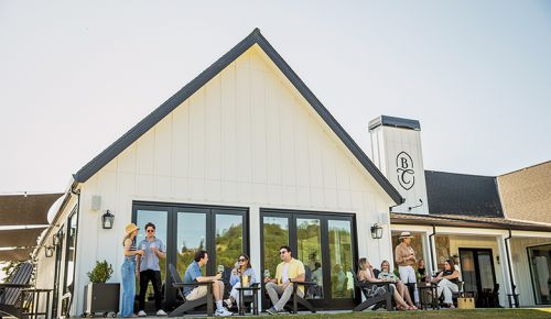 Balsall Creek’s new tasting room offers plenty of comfortable outdoor seating. ## Photo by John Valls
